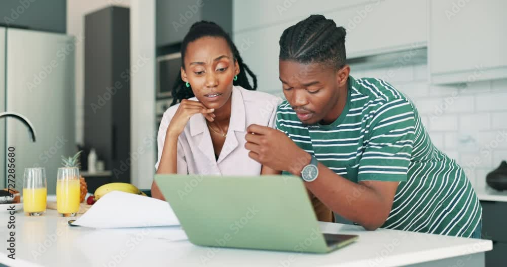 Finance, stress and black couple in home with laptop, investment and budget email in kitchen. Marriage, accounting and online bank payment with debt anxiety from mortgage bills and web payment Finance, stress and black couple in home with laptop, investment and budget email in kitchen. Marriage, accounting and online bank payment with debt anxiety from mortgage bills and web payment