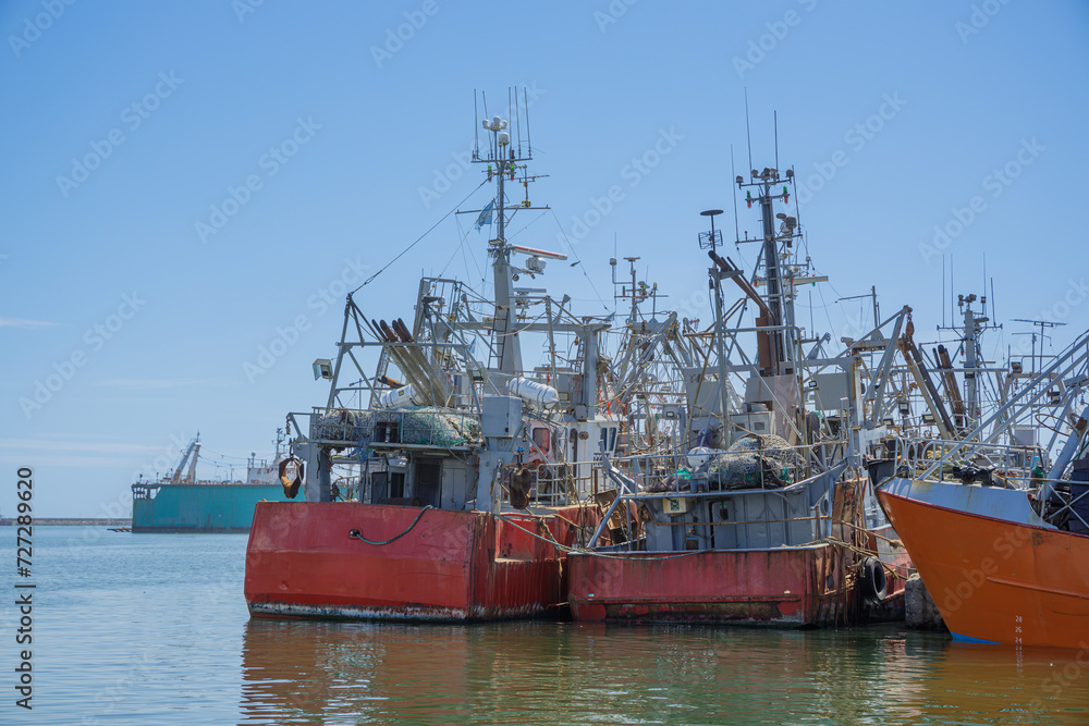 Fishing boats an sea lions in the port of Mar del Plata, Buenos Aires. Fishing boats an sea lions in the port of Mar del Plata, Buenos Aires.