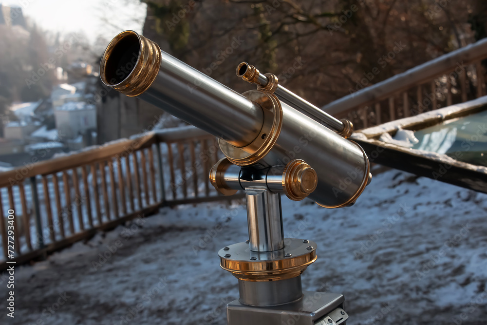 Telescope on the walls of the Hohensalzburg fortress overlooking the Old Town.