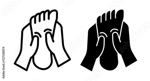 Podiatric treatment line icon. Foot rub icon in black and white color. photo