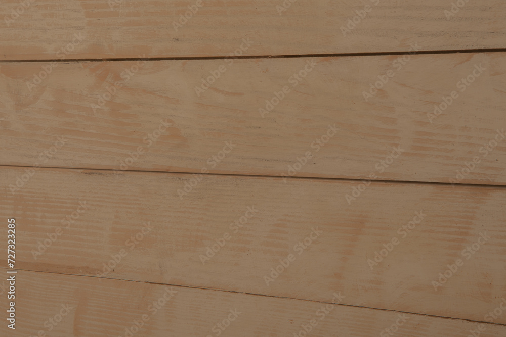 Fototapeta premium Vintage brown wood background texture with knots and nail holes. Old painted wood wall. Brown abstract background. Vintage wooden dark horizontal boards. Front view with copy space