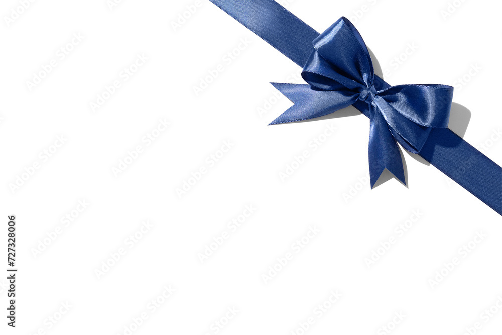 Blue silk ribbon on a white background. Isolated. Top view. Space for text. Blue silk ribbon on a white background. Isolated. Top view. Space for text.