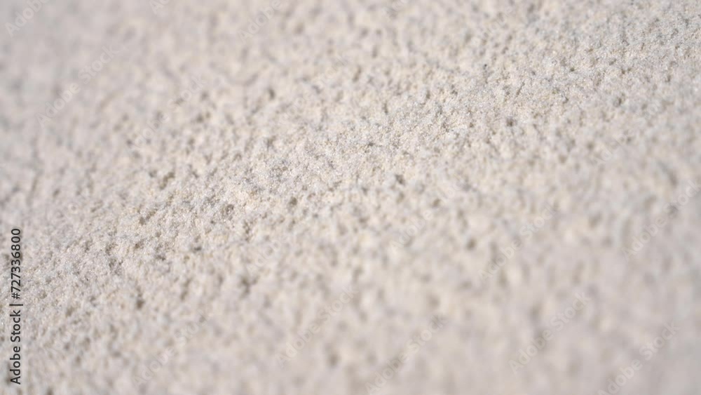 Fine beach sand in the summer sun Fine beach sand in the summer sun