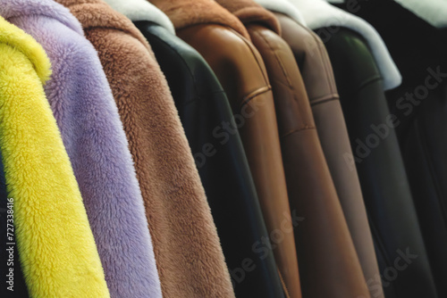 Luxury fur coat very sofly in vintage style, selling clothes in a store concept photo