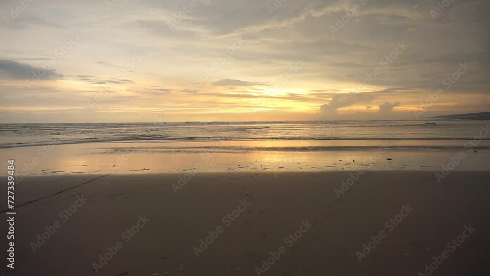 beautiful evening beach view before sunset with small waves on Cipatujah Tasikmalaya beach beautiful evening beach view before sunset with small waves on Cipatujah Tasikmalaya beach
