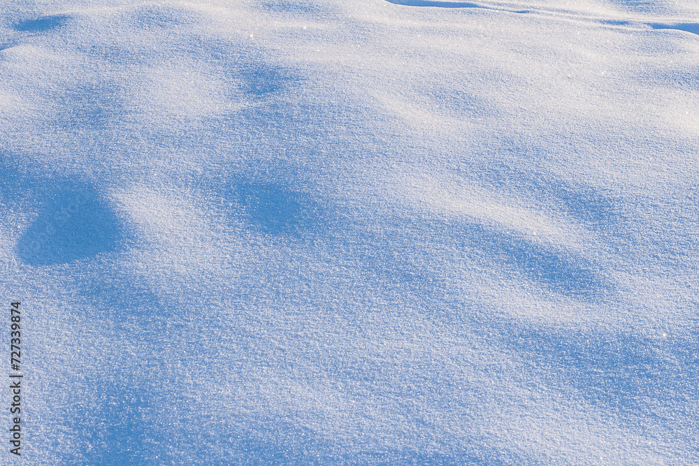 Fresh, snowy surface in sunny weather during the day. Fresh, snowy surface in sunny weather during the day.