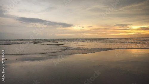 beautiful evening beach view before sunset with small waves on Cipatujah Tasikmalaya beach photo