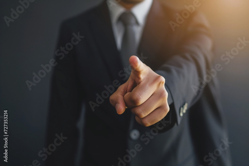 business man points his finger at you