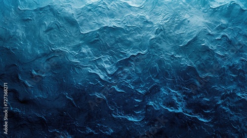 Textured blue abstract background with gradient colors.