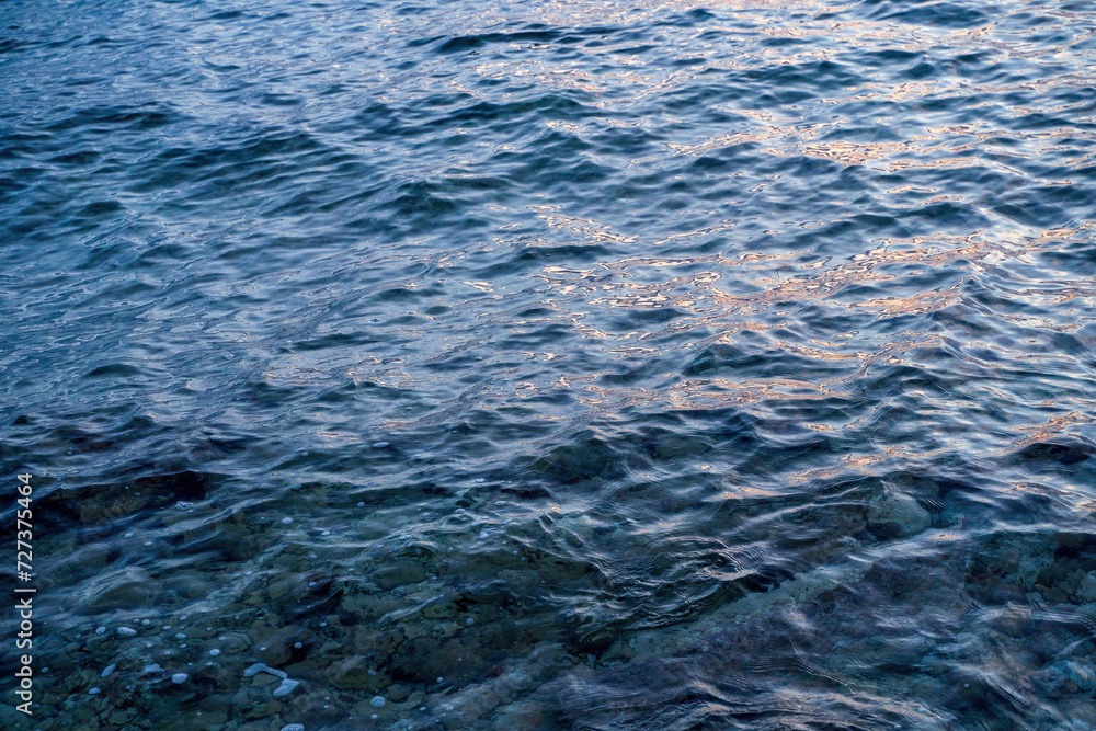 Close-up of clear water on the rocky coastline of Zakynthos, one of the greek island