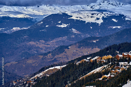 Breathtaking beautiful panoramic view on Snow Alps - snow-capped winter mountain peaks around French Alps mountains, The Three Valleys: Courchevel, Val Thorens, Meribel (Les Trois Vallees), France