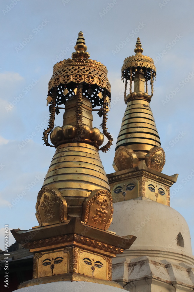 Naklejka premium Stupas Under the Evening Sky
