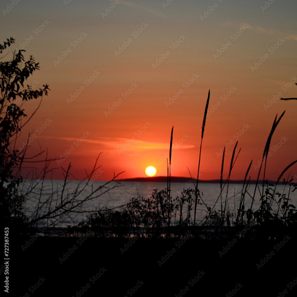 Sea on sunset background, black, orange, red, background