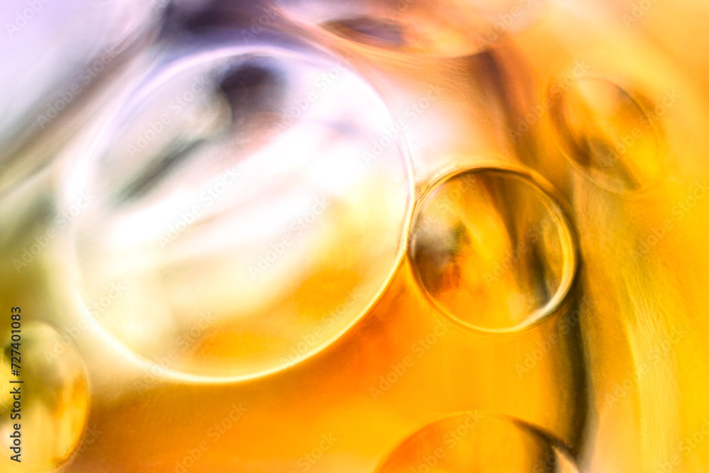 Golden yellow and light pink glass orbs, abstract texture background Golden yellow and light pink glass orbs, abstract texture background
