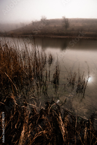 Fogy lake . Mystery lake . Frost lake . Fogy in the river . Night lake . Night photography. Beach and stones . Clouds in night 