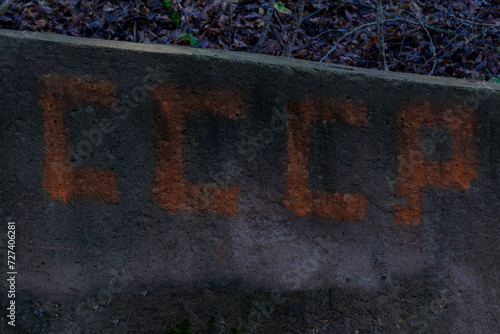 Texture and background on a concrete wall inscription in Russian- USSR