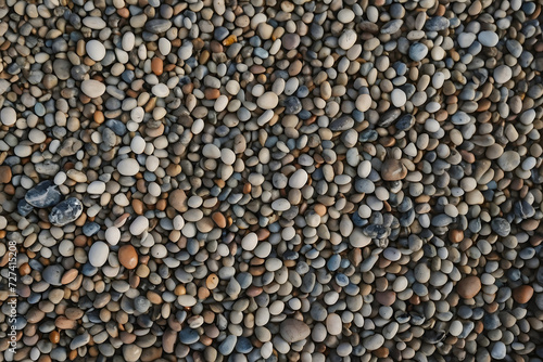 Texture background with colorful sea stones viewed from above