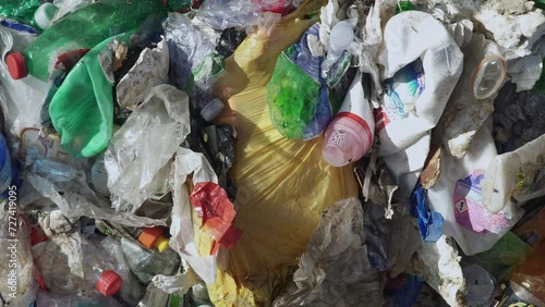 fly flying over PLASTIC WASTE