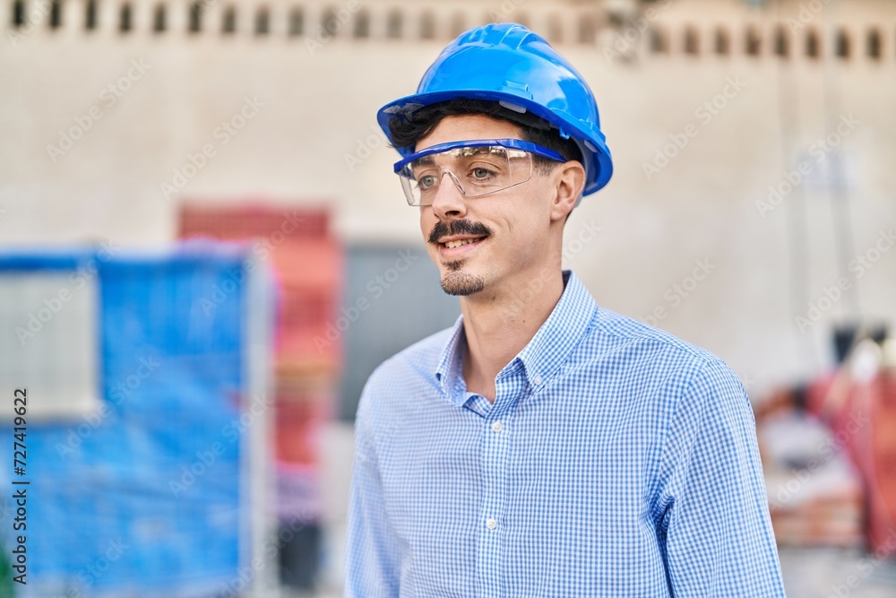 Young caucasian man architect smiling confident standing at street Young caucasian man architect smiling confident standing at street