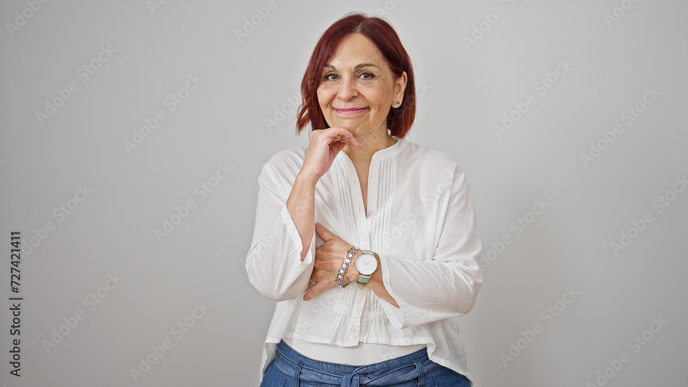 Middle age woman smiling confident standing over isolated white background Middle age woman smiling confident standing over isolated white background