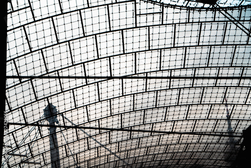 silhouette of a roof over a Munich Olympic Stadium  photo