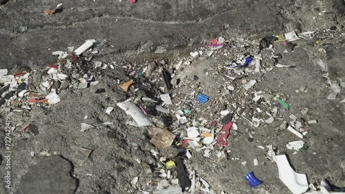 MICROPLASTIC fragments lying on the ground
