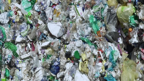  PLASTIC WASTE compacted in a bale lying in the sun