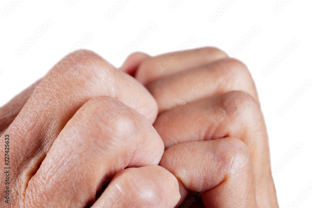 Close up of fingers and knuckles clenched together Close up of fingers and knuckles clenched together