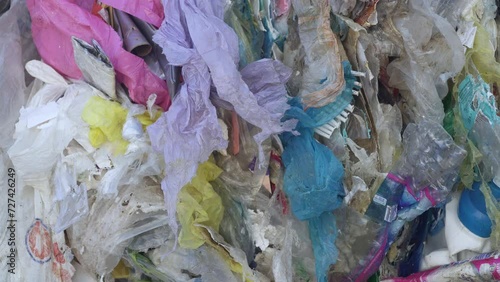 ripped plastic bags moved by the wind