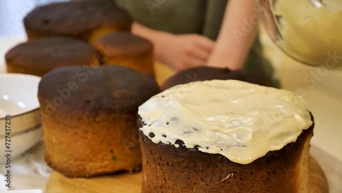 the process of making traditional easter bread cake. step- by-step instructions on preparing the dough, shaping the loaves, and baking the Kulich.  photo