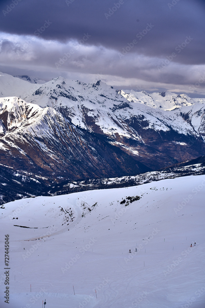 Breathtaking beautiful panoramic view on Snow Alps - snow-capped winter mountain peaks around French Alps mountains, The Three Valleys: Courchevel, Val Thorens, Meribel (Les Trois Vallees), France