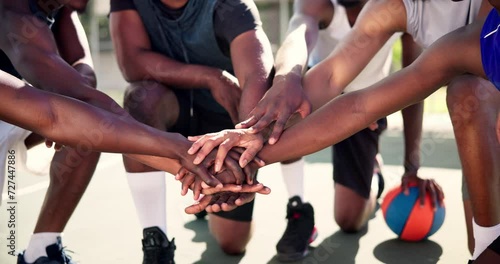 Hands, huddle or people with motivation on basketball court for planning mission, tactics or support. Training game, teamwork or closeup of athletes for solidarity, fitness or workout in sports match photo