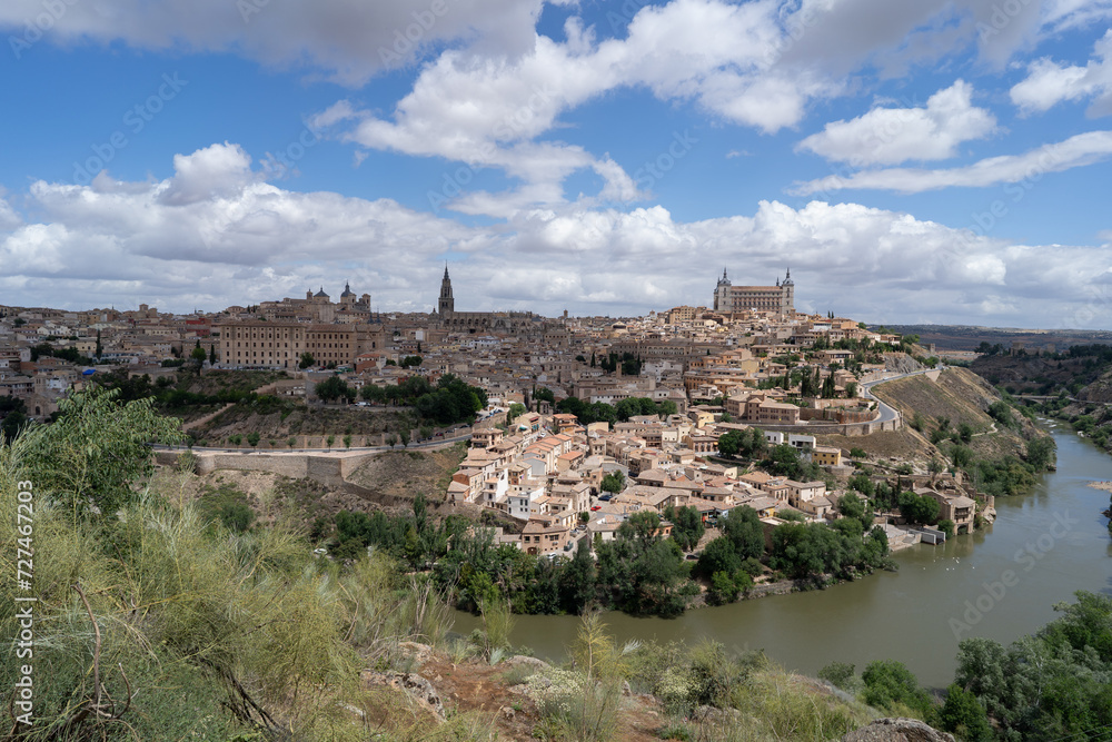 The city of Toledo, Spain with the river Tagus in the foreground.