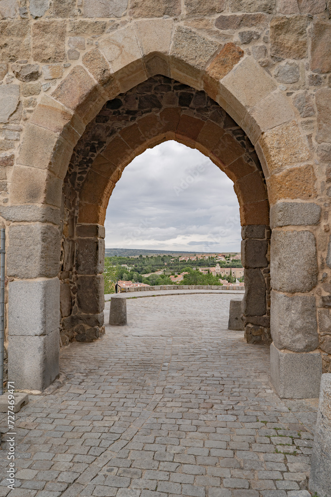 View of the landscape through one of the many ports in Avila, Spain.