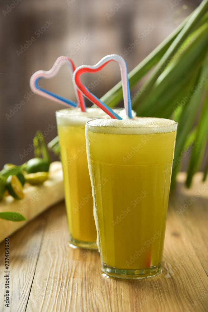 Nuoc mia is Vietnamese sugarcane juice. In the tropical country, it is ...