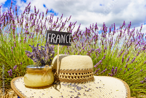 Jar with honey at lavender field. Holidays in France.