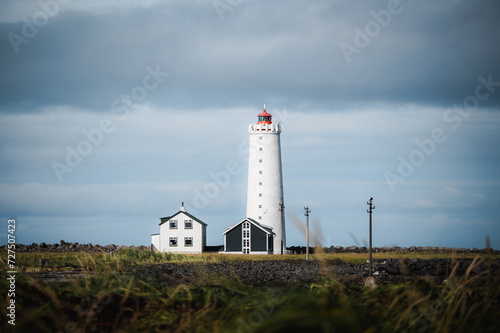 Grotta lighthouse on coast of Iceland near Reykjavik. Seascape, travel landmark. Copy space banner