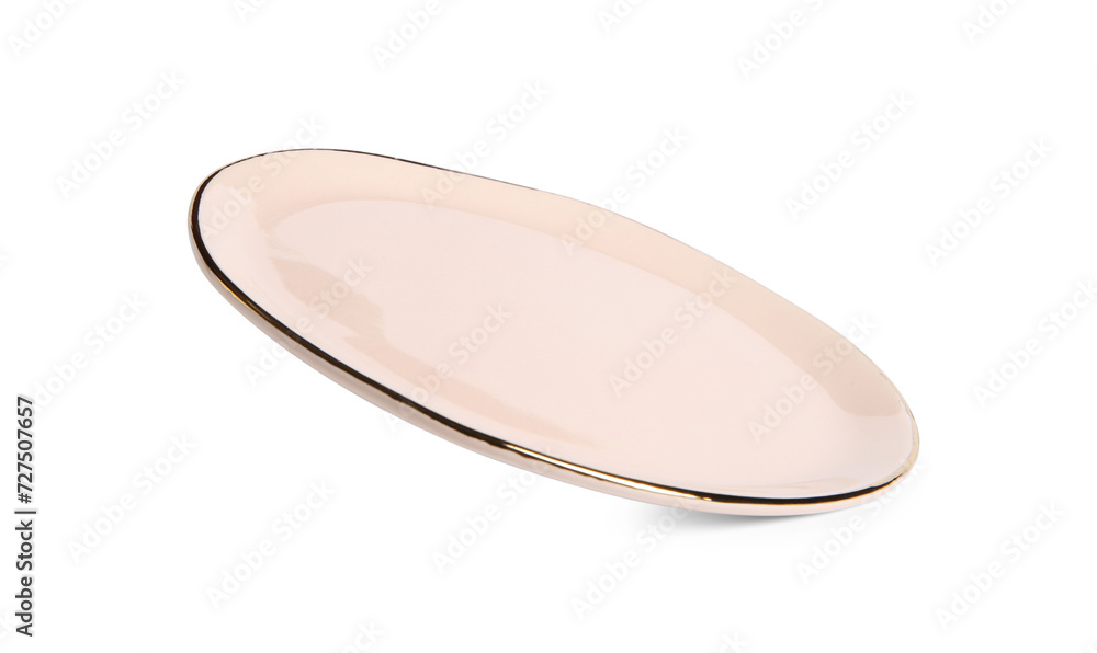 One beige ceramic plate isolated on white One beige ceramic plate isolated on white