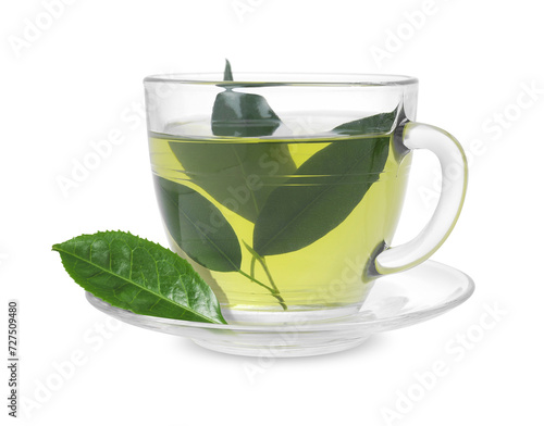 Green tea in glass cup and leaves isolated on white