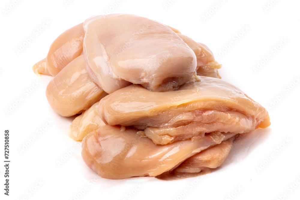a pile of skinless and boneless chicken breasts isolated on white