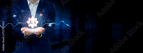 Businessman holding virtual API network connection icons. Integration, Interoperability, Connectivity in Internet business and social network. photo