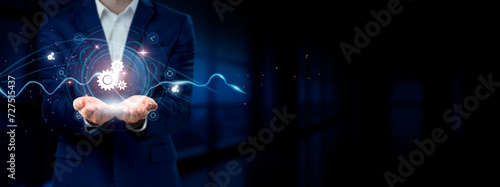 Businessman holding virtual Automation network connection icons. Streamlining Processes, Efficiency, Seamless Internet business, and Social Network Integration. photo