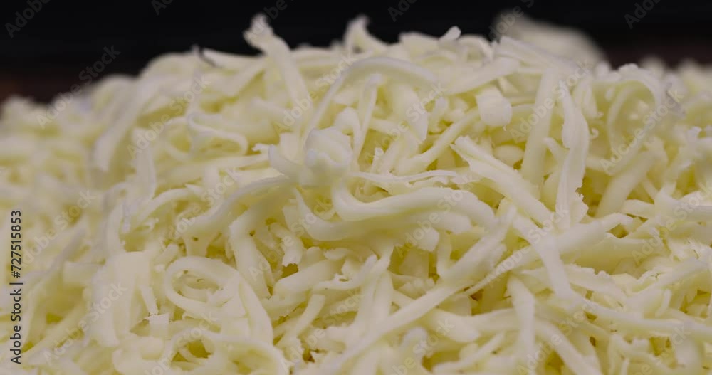 grated cheese in large quantities at home, grated cheese for cooking in the kitchen grated cheese in large quantities at home, grated cheese for cooking in the kitchen