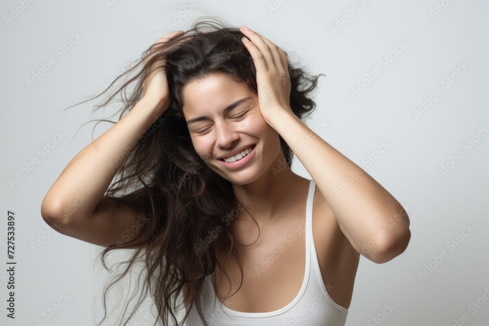 Woman with hand on head, headache Woman with hand on head, headache