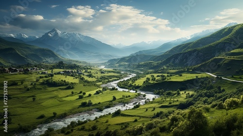 Verdant valleys with winding river, panoramic mountainous view