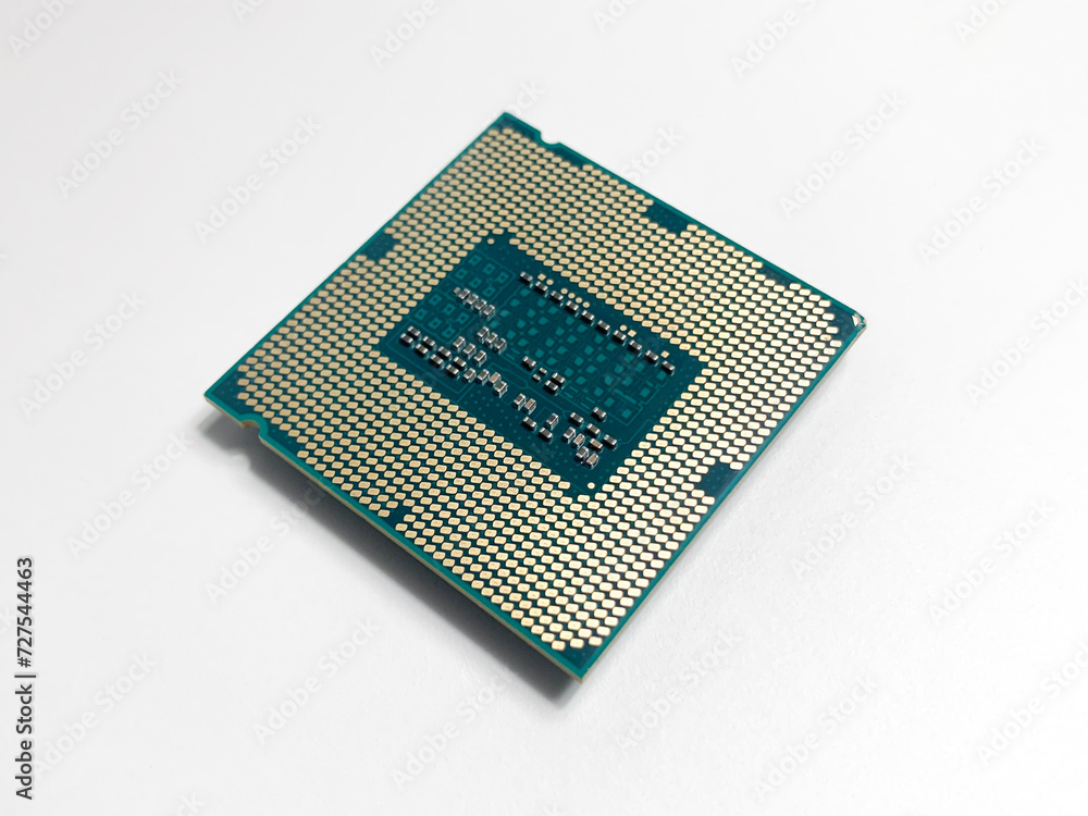 Computer processor. Rear of CPU with gold contacts. Computer processor. Rear of CPU with gold contacts.