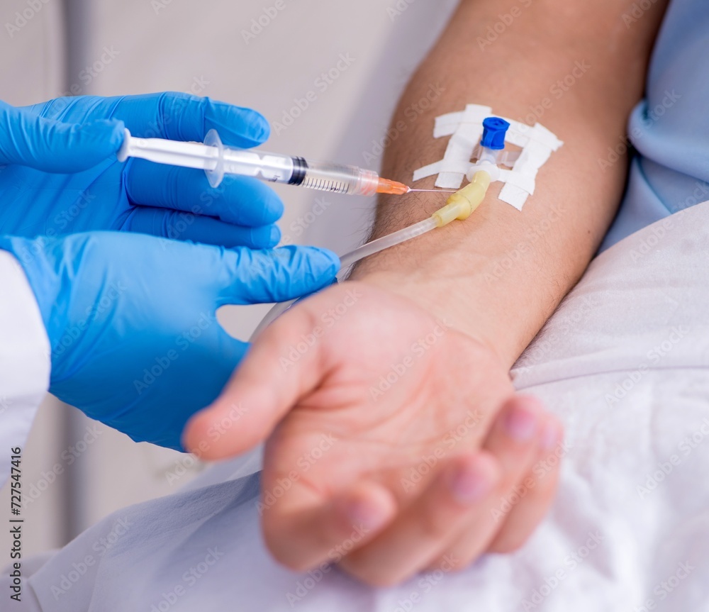Male patient in blood transfusion concept Male patient in blood transfusion concept