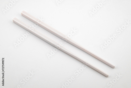 white plastic chopsticks for sushi and Asian cuisine