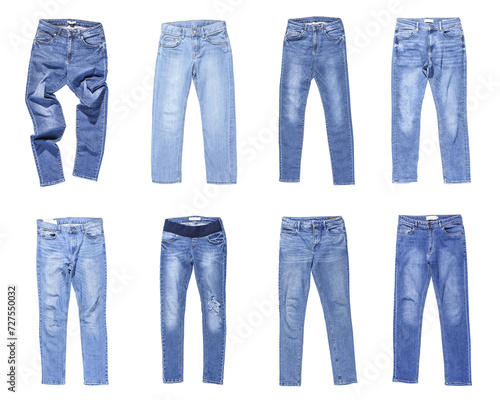 Set of different stylish jeans pants isolated on white