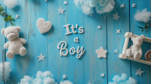 Its a Boy, in text over blue wood and white stars and hearts